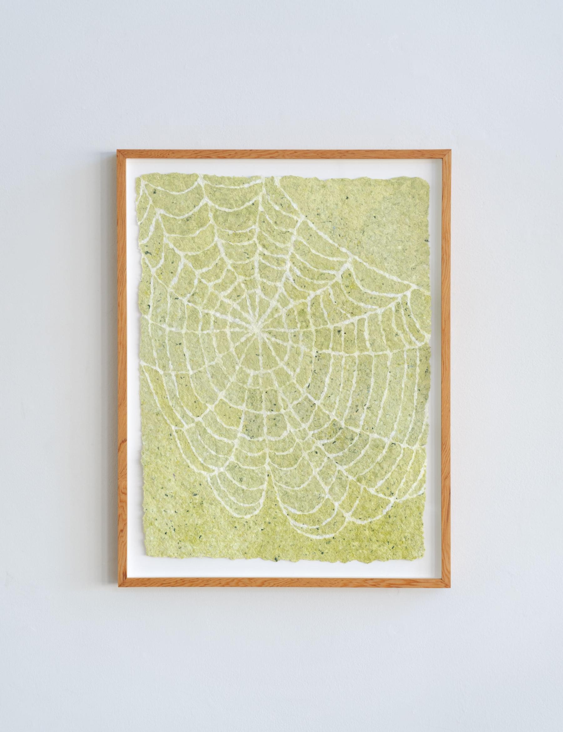 green web paper pulp painting made from recycled cotton t-shirts